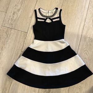 Girls black & white party dress below the knee